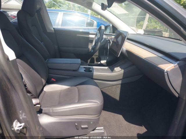 2023 TESLA MODEL Y 7SAYGDED7PF947357 Photo 4