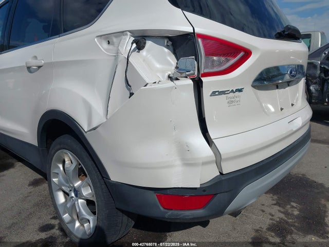 1FMCU9JXXEUA38493 Ford 2014