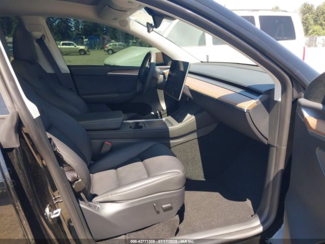 2023 TESLA MODEL Y 7SAYGDEE8PF947747 Photo 4