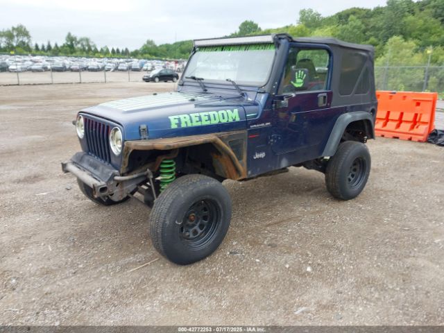 2000 JEEP WRANGLER 1J4FA29P4YP740134 Photo 1