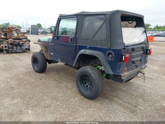 2000 JEEP WRANGLER 1J4FA29P4YP740134 Photo 2