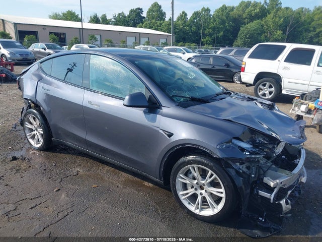 2023 TESLA MODEL Y 7SAYGDEE8PF887386 Photo 0