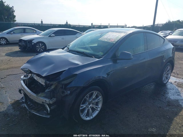 2023 TESLA MODEL Y 7SAYGDEE8PF887386 Photo 1