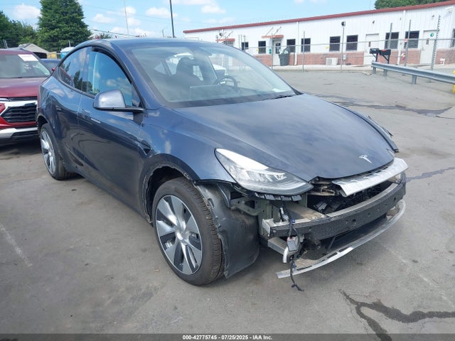 2023 TESLA MODEL Y 7SAYGDEE3PA036349 Photo 0