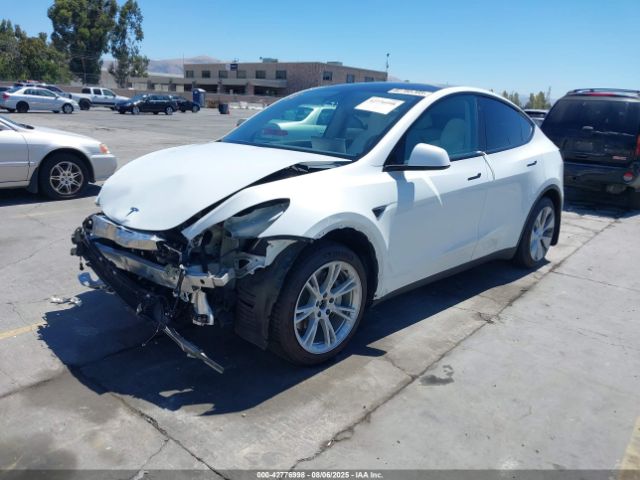 2022 TESLA MODEL Y 7SAYGAEE9NF485999 Photo 1