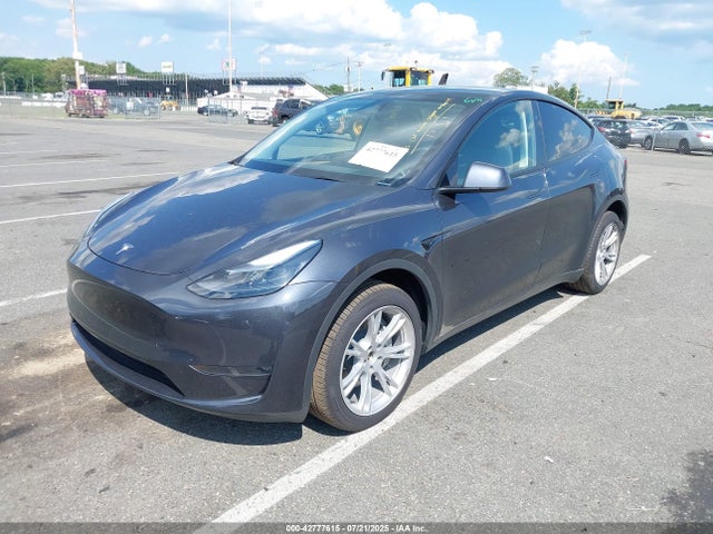2024 TESLA MODEL Y 7SAYGDEE6RA236418 Photo 1