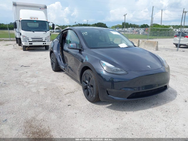2024 TESLA MODEL Y 7SAYGDED3RF163552 Photo 0