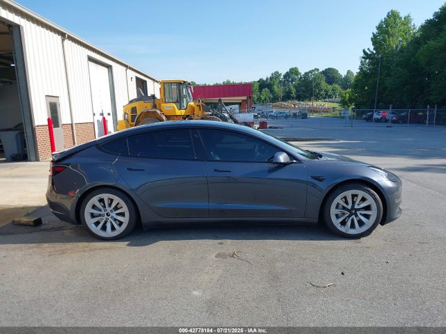 5YJ3E1EA6NF190823 Tesla 2022