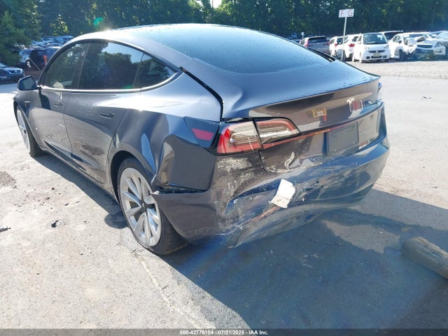 5YJ3E1EA6NF190823 Tesla 2022
