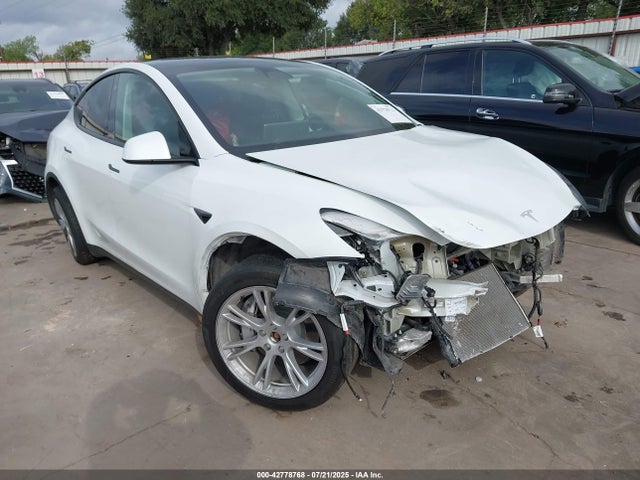 2023 TESLA MODEL Y 7SAYGDEE3PA110658 Photo 0