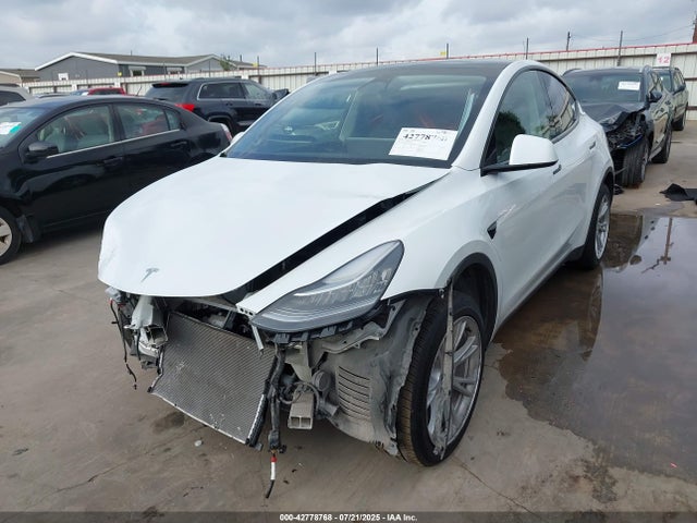 2023 TESLA MODEL Y 7SAYGDEE3PA110658 Photo 1
