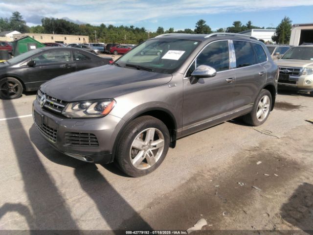 2011 VOLKSWAGEN TOUAREG WVGFF9BP2BD005179 Photo 1