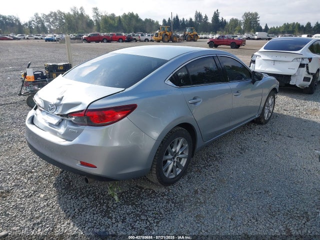 JM1GJ1U52G1487794 Mazda py