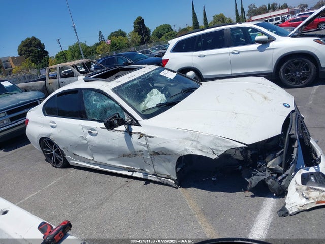WBA5R1C52KAK09694 BMW 330I