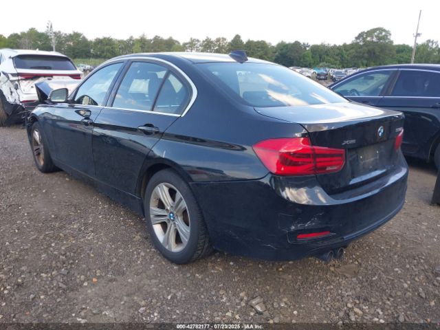 2018 BMW 330I WBA8D9G51JNU67426 Photo 2