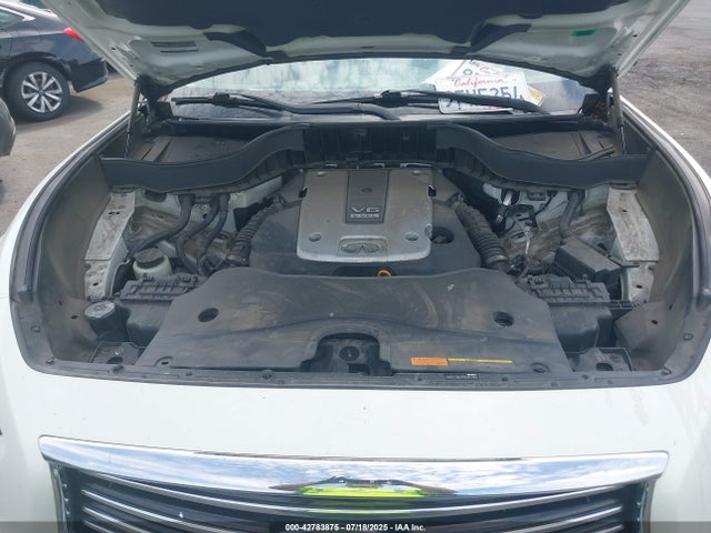 JN8CS1MU9FM381282 Infiniti 2015