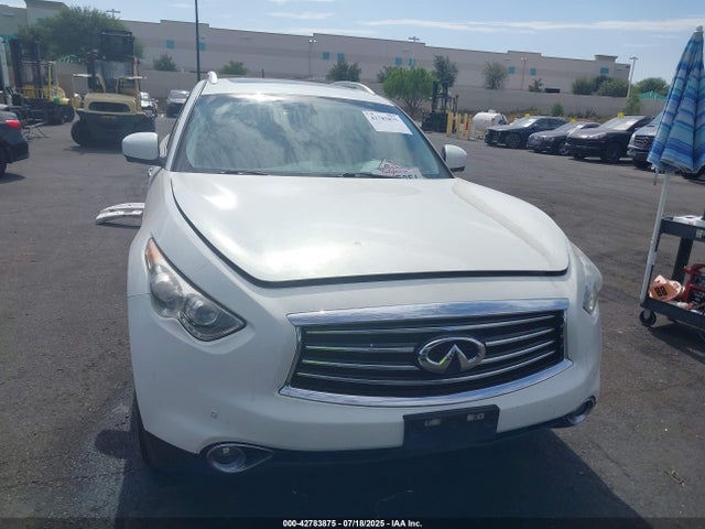 JN8CS1MU9FM381282 Infiniti 2015