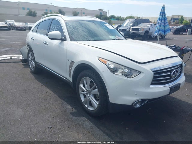 JN8CS1MU9FM381282 Infiniti 2015