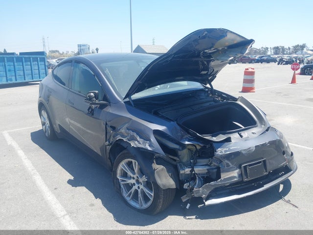 2023 TESLA MODEL Y 7SAYGDEE8PF808816 Photo 0