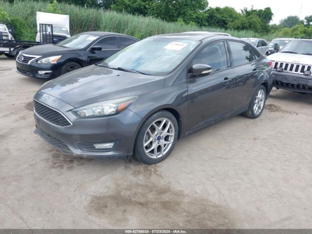 2015 FORD FOCUS 1FADP3F28FL231197 Photo 1