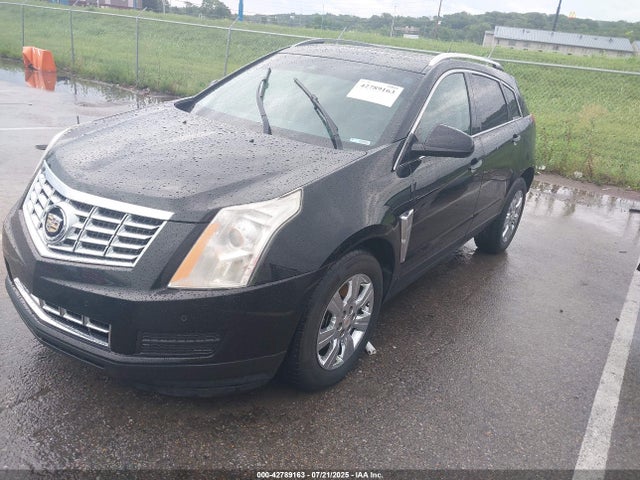 2014 CADILLAC SRX 3GYFNEE32ES562052 Photo 1