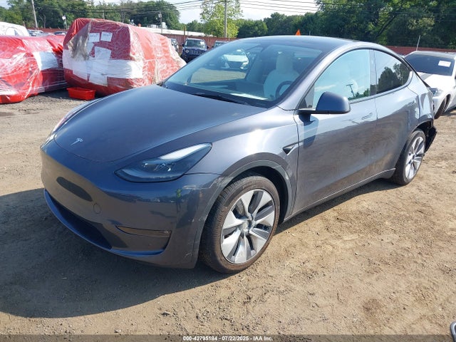 2023 TESLA MODEL Y 7SAYGAEE9PF873334 Photo 1