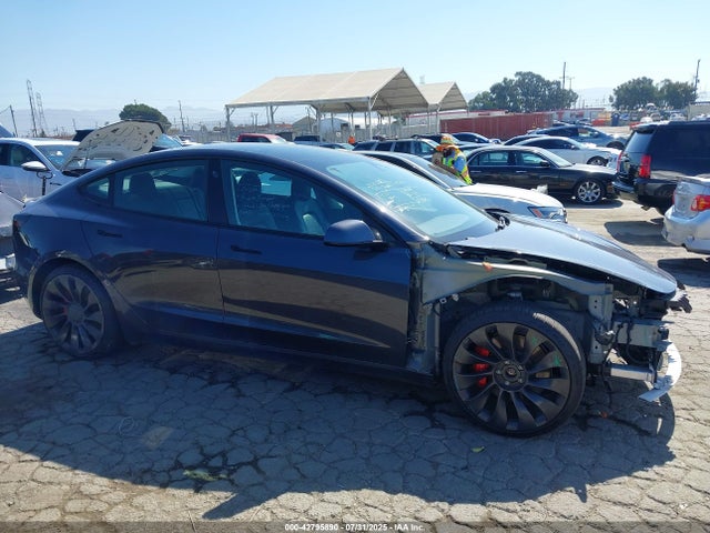 5YJ3E1EC7MF073977 Tesla 2021