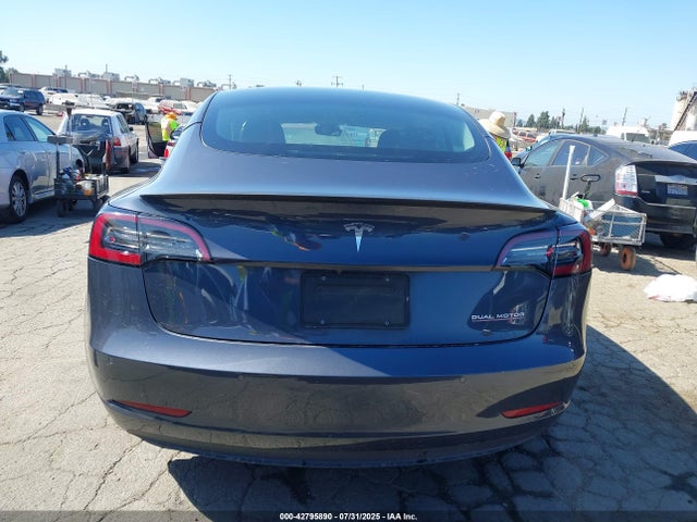 5YJ3E1EC7MF073977 Tesla 2021