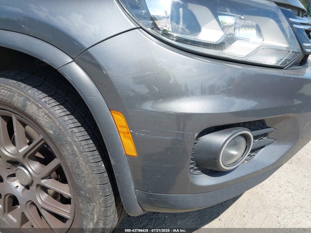 WVGBV3AX4EW046518 Volkswagen Tiguan