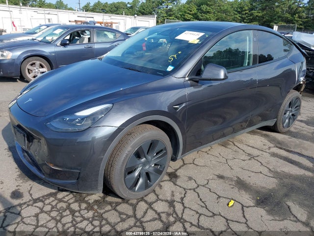 2024 TESLA MODEL Y 7SAYGDED6RF206264 Photo 1