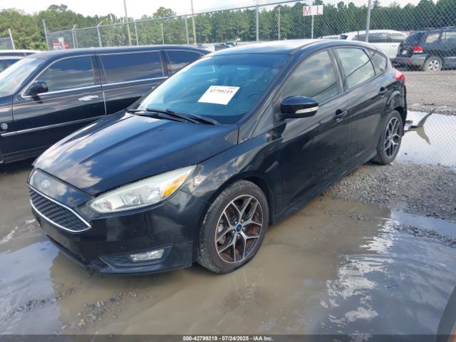 2015 FORD FOCUS 1FADP3K22FL267523 Photo 1