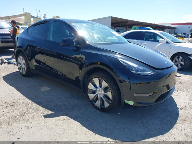 2023 TESLA MODEL Y 7SAYGDEE9PF637414 Photo 0