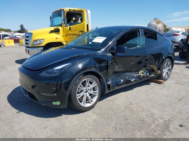 2023 TESLA MODEL Y 7SAYGDEE9PF637414 Photo 1
