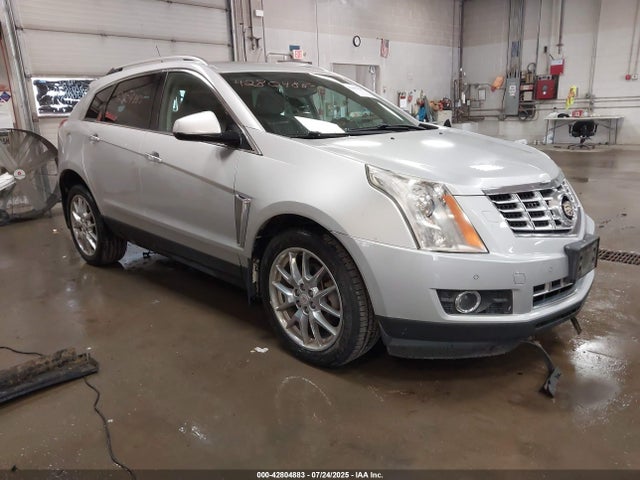 2014 CADILLAC SRX 3GYFNFE34ES657122 Photo 0