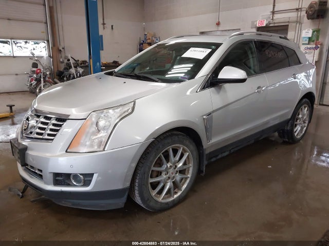 2014 CADILLAC SRX 3GYFNFE34ES657122 Photo 1