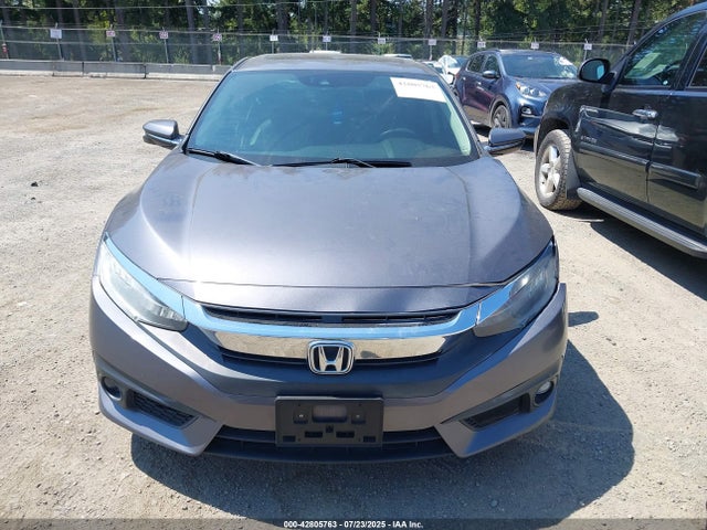 2HGFC1F9XGH633285 Honda l15b7
