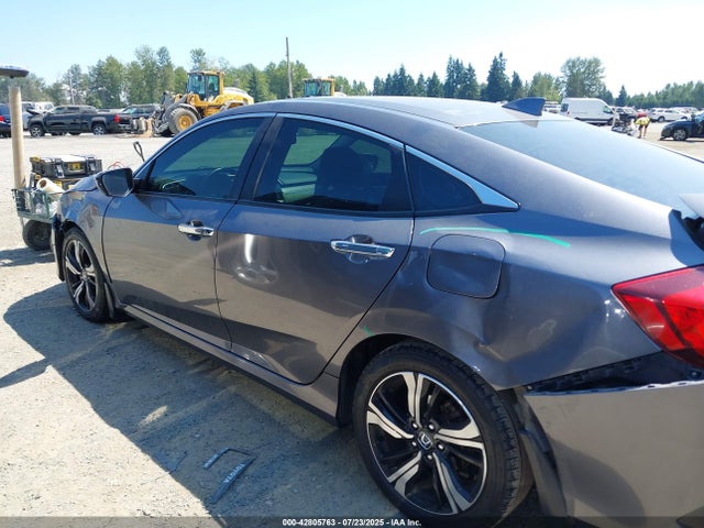 2HGFC1F9XGH633285 Honda l15b7