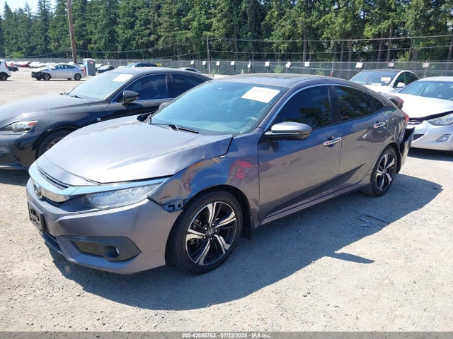 2HGFC1F9XGH633285 Honda l15b7