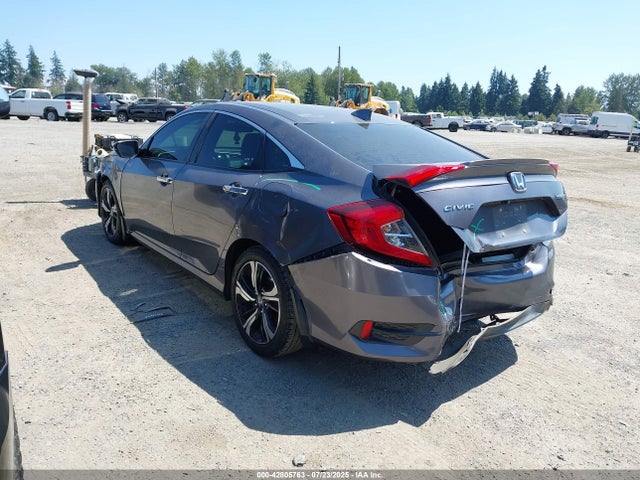 2HGFC1F9XGH633285 Honda l15b7