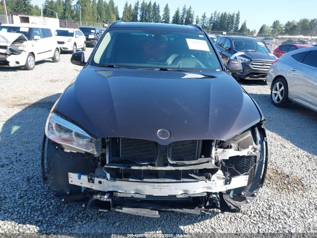 5UXKR0C56E0H26427 BMW 2014