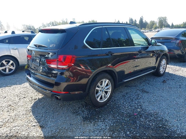 5UXKR0C56E0H26427 BMW 2014