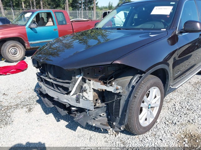 5UXKR0C56E0H26427 BMW 2014