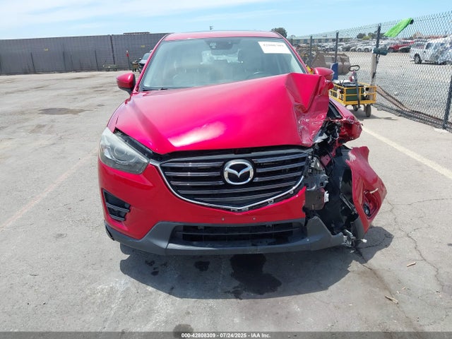 JM3KE2DY1G0788794 Mazda py