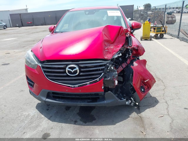 JM3KE2DY1G0788794 Mazda py