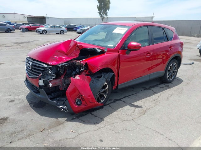 JM3KE2DY1G0788794 Mazda py