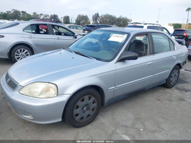 1999 HONDA CIVIC JHMEJ667XXS002104 Photo 1