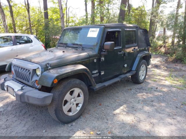 2010 JEEP WRANGLER UNLIMITED 1J4BA5H17AL187277 Photo 1