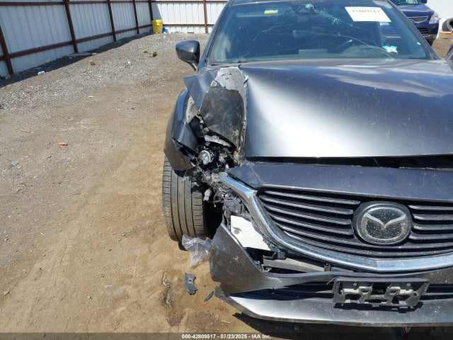 JM1GL1X52H1139839 Mazda py
