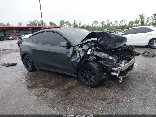 2024 TESLA MODEL Y 7SAYGDED5RF046877 Photo 0