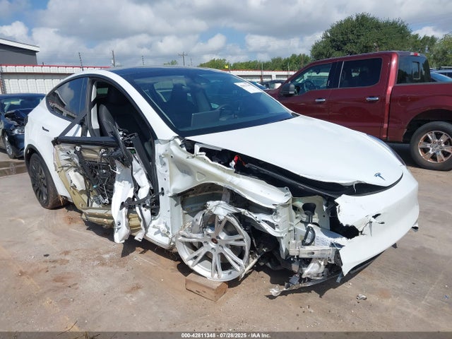 2023 TESLA MODEL Y 7SAYGDEE1PA127412 Photo 0